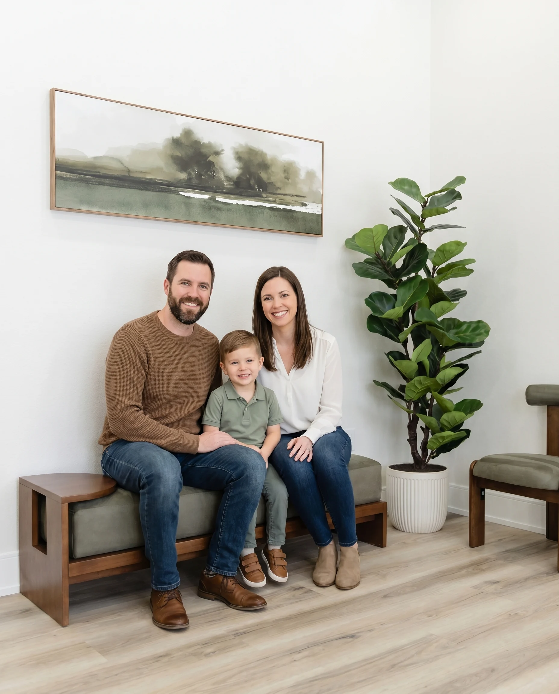 A family seated together in the seesmile waiting area
